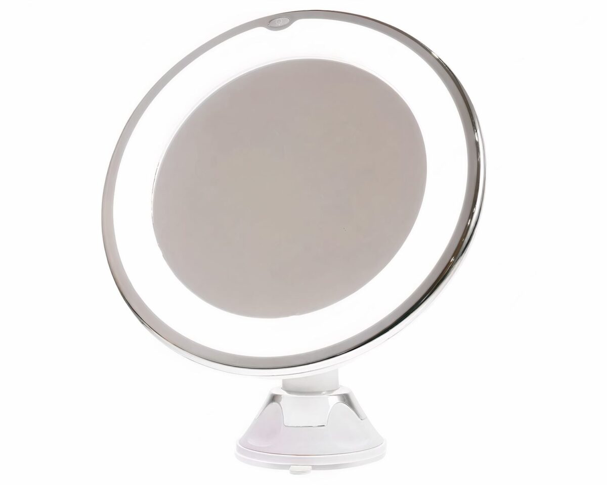 Miroir circulaire sur fond blanc.