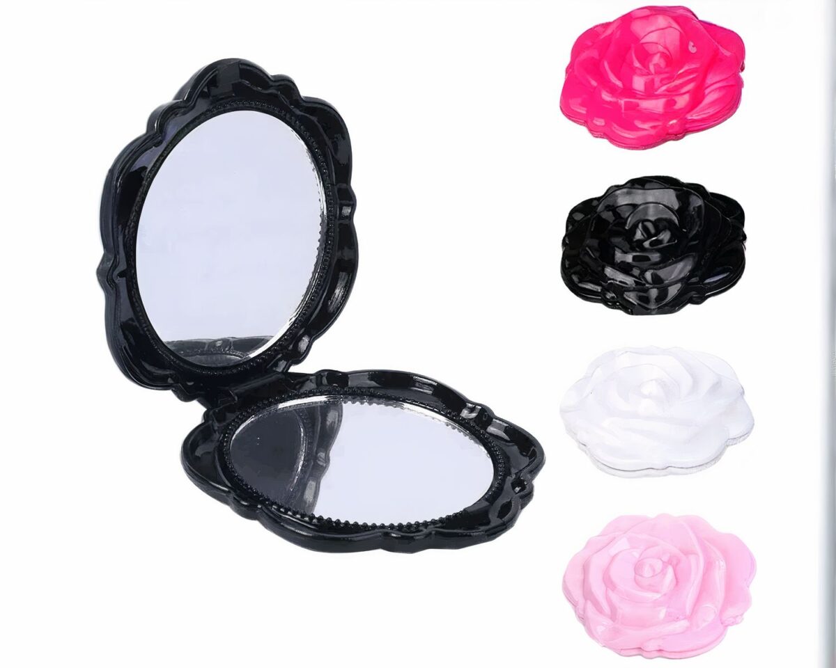 Miroir pliant en forme de rose sur fond blanc.