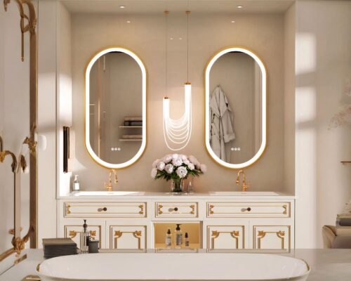 Miroirs ovales au-dessus d'une vasque de salle de bain.