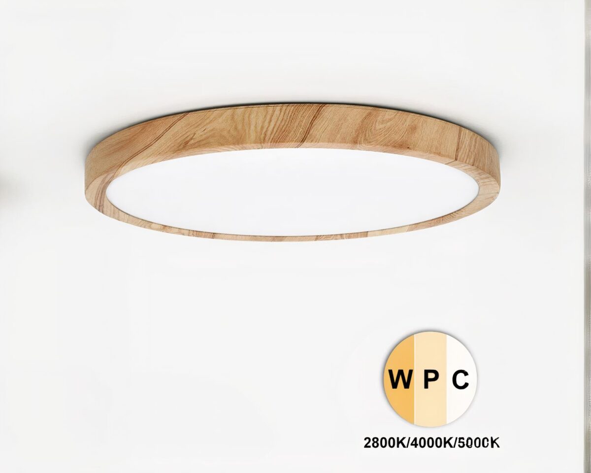 Photo d'un plafonnier rond et fin entouré de bois clair avec un cercle en bas montrant le sigle de la lumière changeante, le tout sur un fond gris très clair