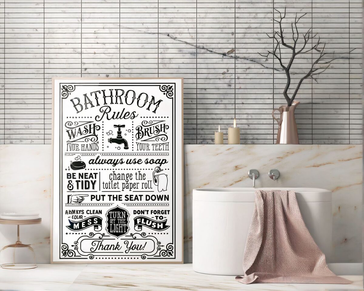 Tableau avec règles de la salle de bain posé sur un meuble en marbre.